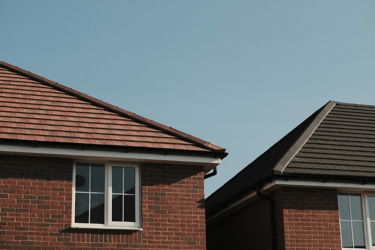 Brick walls and eaves under a dark tile roof